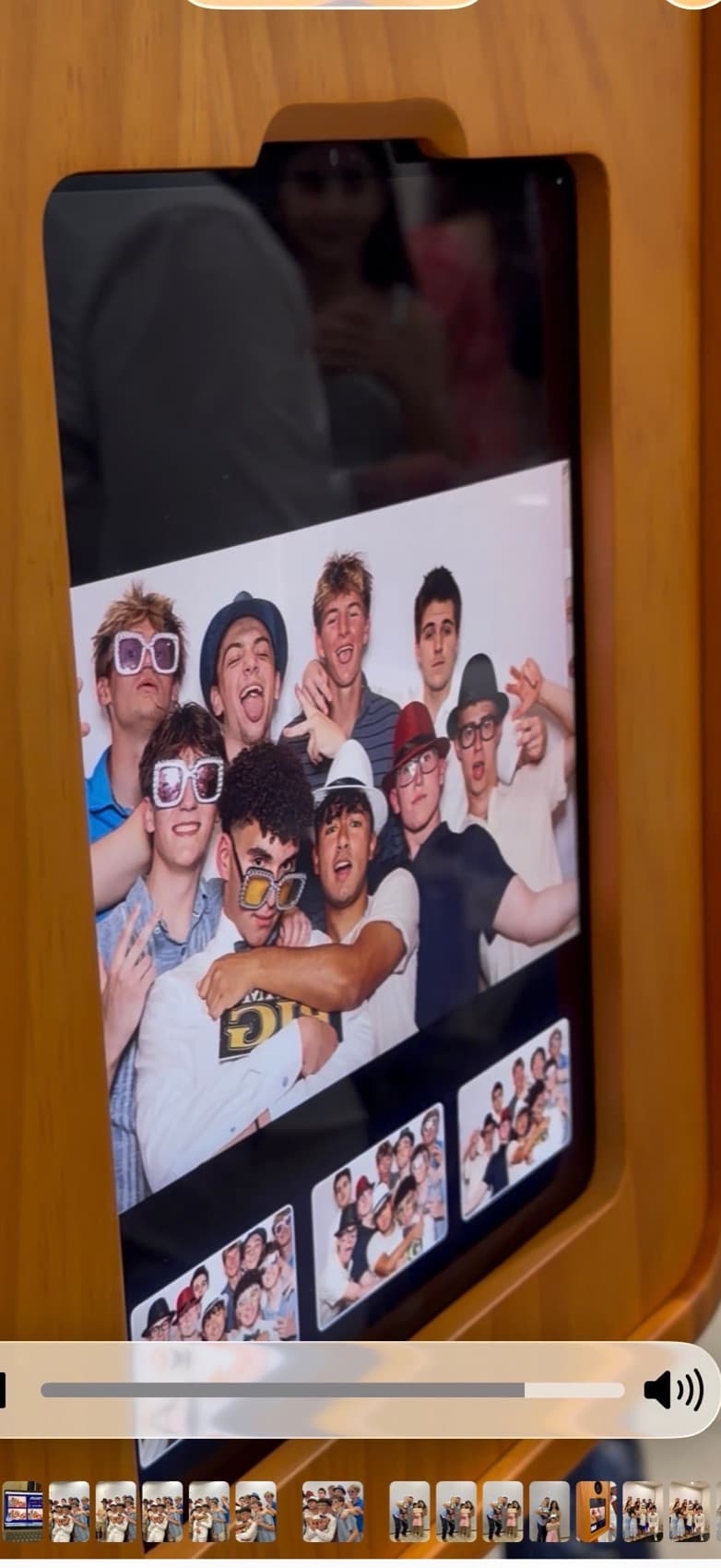Michigan party guests taking photo booth pictures